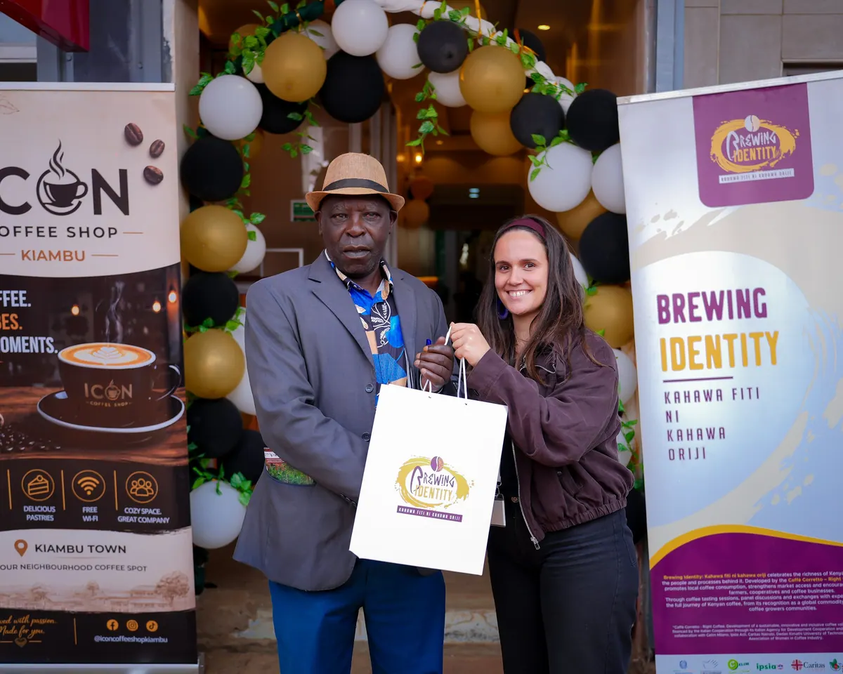 A gift bag handed over at the balloon arch outside Icon Coffee Shop